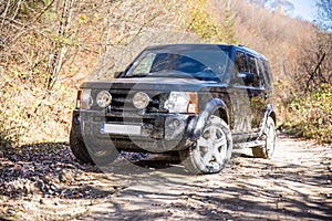 SUV on rocky road