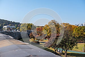 Suwon Hwaseong Fortress Wall, with the park view during autumn.