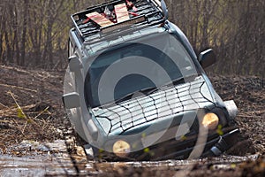 Suzuki Jimny crossing water obstacle photo