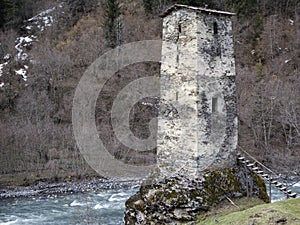 Svan Ancient tower on the bank of the river, Svaneti, Georgia