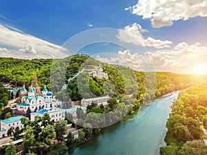 Svaytogorsk lavra ancient monastery hills panoramic view with green forest and Donets river at Donbass, Ukraine on photo
