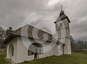 Sveta Katarina church over Zasip village in spring morning in Slovenia