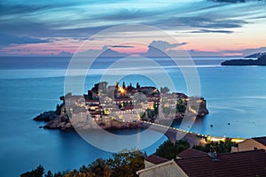 Sveti Stefan island at dusk, Montenegro photo