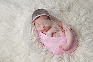 Swaddled, Sleeping Newborn Baby Girl