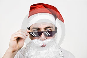 Swag Santa Claus in funny pixelated sunglasses on white background. Gangster, boss, thug life meme. 8bit style. Holly Jolly x Mas