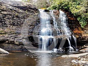 Swallow Falls State Park in the fall in the mountains of Maryland with the creek and waterfalls flowing, cascading in nature,