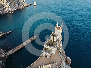 Swallow Nest - ancient castle on top of mountain cliff near sea Yalta region, Crimea. Beautiful famous palace architecture