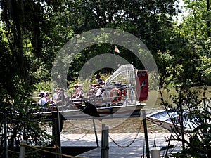 A swamp boat tour of the Bayous outside of New Orleans in Louisiana USA