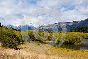 Swamp, peaks and Mt Aspiring NP, Southern Alps, NZ