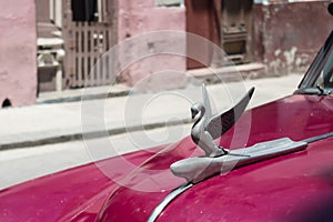 Swan emblem on a vintage car of the now disappeared Packard company, in Havana Cuba