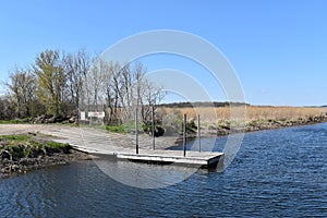 Swan Lake, Nicollet, MN USA - 04 24 2021 - boat landing and dock