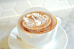 Swan latte art on cappuccino photo
