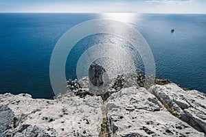 Swan Wing Rock in Simeiz from above against sun light. Black Sea coast, Crimea