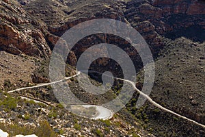 Swartberg Pass winding up the mountain on the contour line
