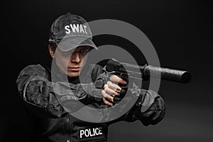 SWAT police officer with pistol