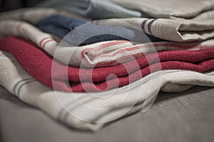 Swatch of Stack of Striped and Plain Cotton Fabric