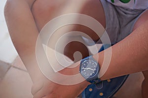 Swatch watch close up teenager