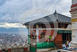 Swayambhunath Stupa complex with monkey on the fence. Kathmandu, Nepal
