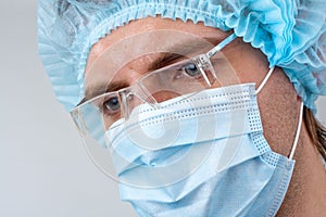 Sweat surgeon in surgical mask