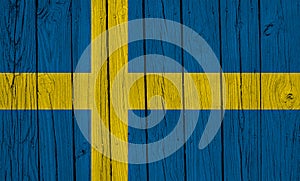 Sweden Flag Over Wood Planks