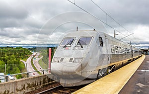 Sweden high-speed train on SodertÃÂ¤lje syd station photo