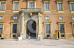 Sweden, Stockholm, May 29, 2018: Guard soldier at post near central enter facade Swedish Royal Palace