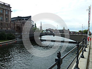 Sweden, Stockholm - the Riksbron bridge, Riksdagshuset and canal in Stockholm.