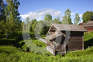 Rattvik city in Sweden, an old water mill in an open-air museum photo