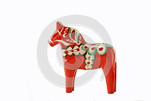 Swedish dalahorse figurine on a white background