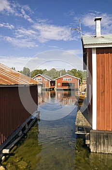 Swedish harbour with traditional red painted houses
