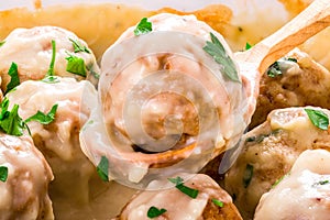Swedish homemade meatballs smothered in a creamy gravy sauce, ma