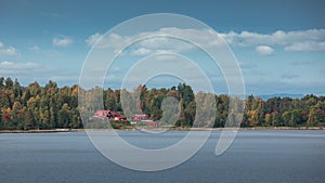 Swedish houses at lakeside of Lake Siljan in Dalarna, Sweden photo
