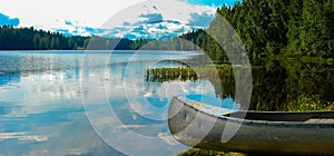 Swedish lake with canoe photo