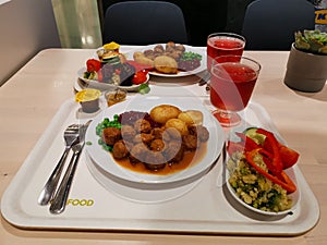 Swedish meatballs on IKEA restaurant salad included photo