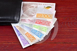 Swedish money in the black wallet photo