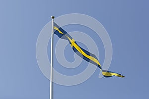 Swedish Pennant with a clear blue sky