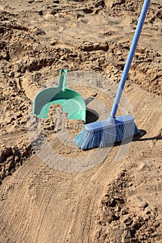 Sweeping the beach (irony)