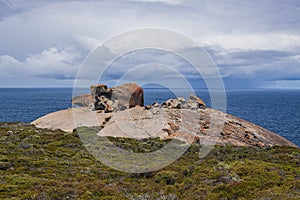 The sweeping bush vegetation, the Remarkable Rocks formation and the sea at Flinders Chase National Park on Kangaroo Island.