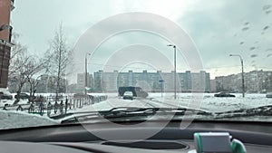 sweeping car windshield wipers to clear windshield, slow motion scene