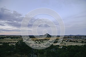 Sweeping landscape shot of Pyramid Hill in central Victoria, Australia with overcast sky