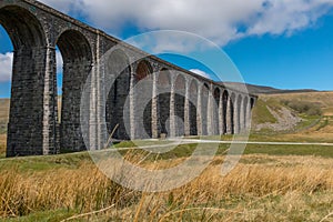 The sweeping magnificent Ribblehead Viaduct stands tall above the Ribble Valley, carrying the Settle to Carlise railway