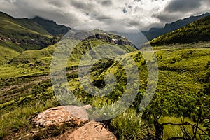 Sweeping mountain sides and cliff faces on the Thukela hike to the bottom of the Amphitheatre`s Tugela Falls in the Royal Natal