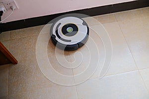 Sweeping robot working on floor