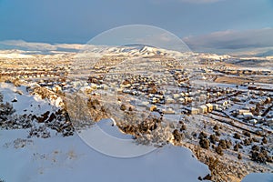 Sweeping view of homes in a picturesque neighborhood amidst scenic winter views