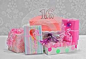 Sweet 16 birthday cake and gifts