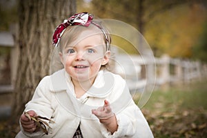 Sweet Baby Girl Playing in Park