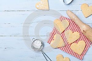 Sweet baking for Valentines day. Shortbread cookies in shape of heart top view.