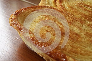 Sweet bread detail, traditional oreja mexican sweet bread close up photo