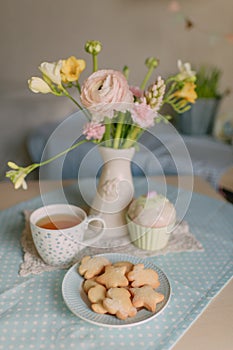 Sweet breakfast on a spring background in pastel colors