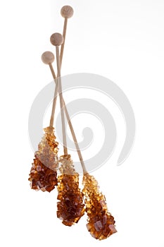 Sweet brown sugar isolated over white